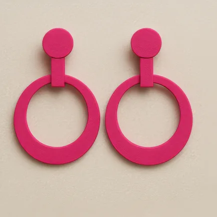 Red hoop earrings with circular top and open ring design