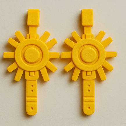 SolarForge bold yellow sunburst 3D printed earrings, featuring a radiating geometric sun design.
