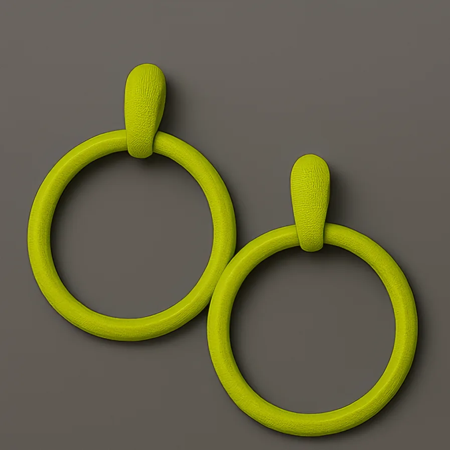 Green hoop earrings with sculptural matte texture by MonoContrast