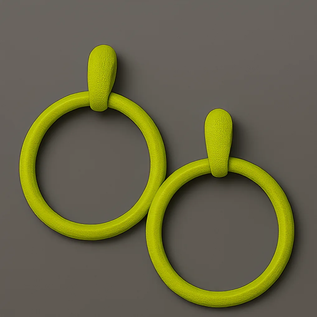 Green hoop earrings with sculptural matte texture by MonoContrast