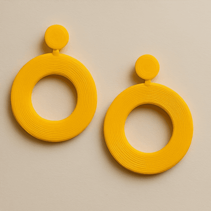 Circular stud earrings with bold yellow hoop silhouette