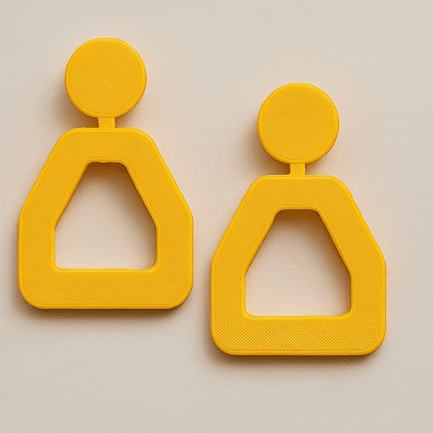 GeoFacet bright yellow geometric cutout 3D printed earrings featuring a unique structural design.