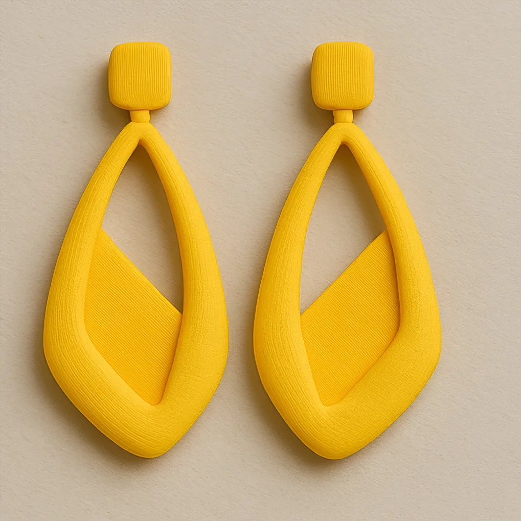 Sunbeam Drop bright yellow cutout drop 3D printed earrings featuring a unique teardrop shape.