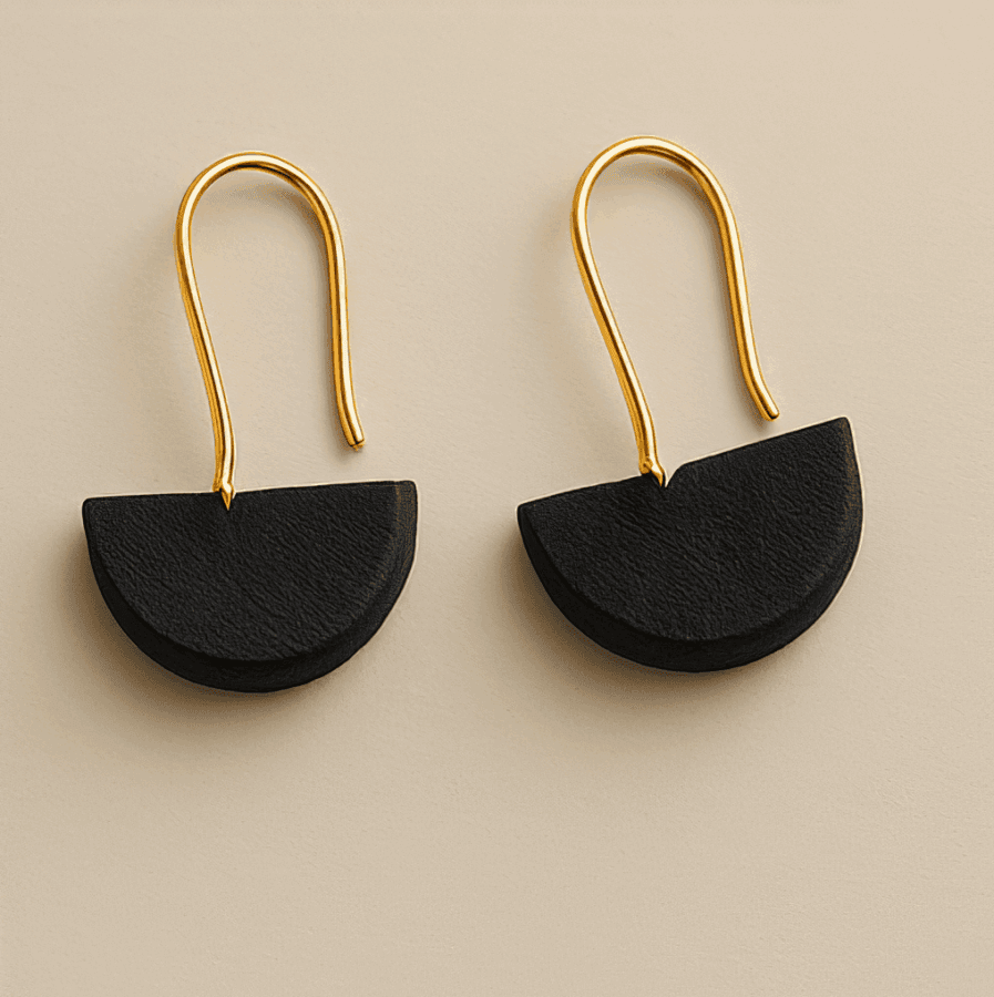 Earrings with black half-circle design and gold hooks
