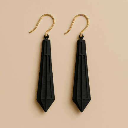 Long gold dangle drop earrings in matte black with sculpted 3D printed finish