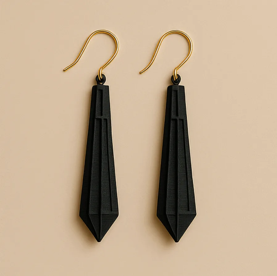Long gold dangle drop earrings in matte black with sculpted 3D printed finish