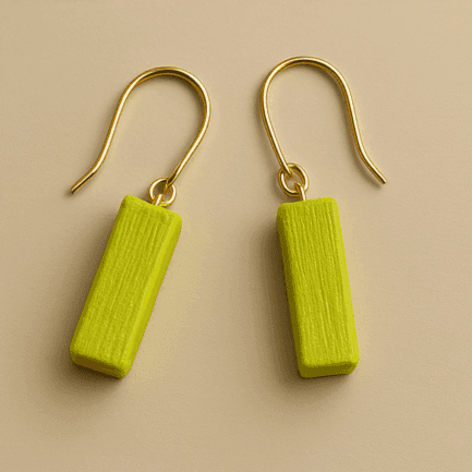 Small gold dangle earrings with neon green rectangular charm