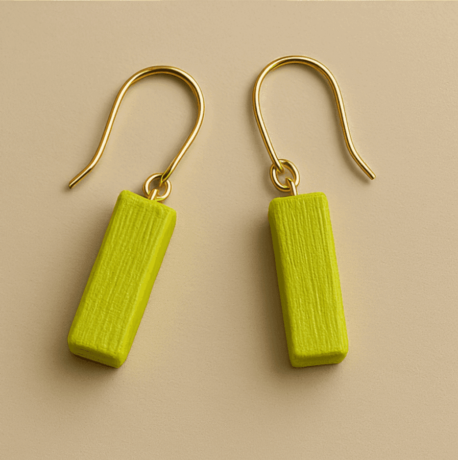Small gold dangle earrings with neon green rectangular charm