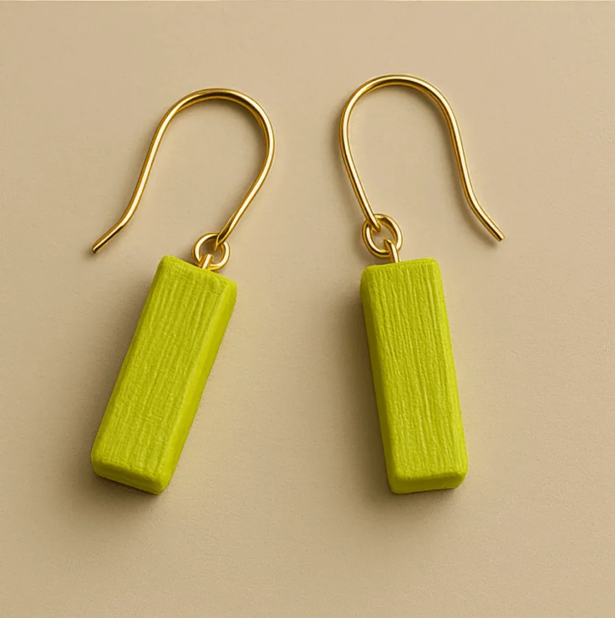 Small gold dangle earrings with neon green rectangular charm