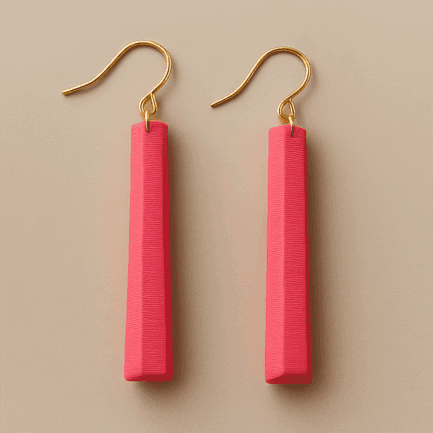Long pink dangle earrings with gold fish-hook and sculpted matte finish