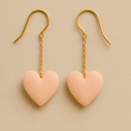 Pink heart earrings with gold chain drop and 3D printed texture