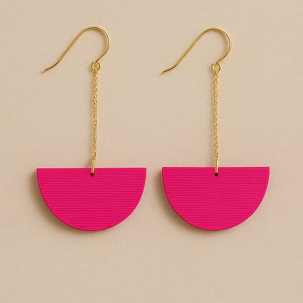 Pink dangle geometric earrings with gold chain and matte half-circle design