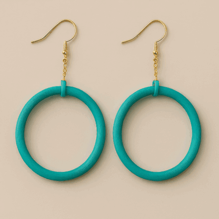 Turquoise dangle hoop earrings with gold hooks and circular matte frame