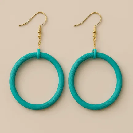Turquoise dangle hoop earrings with gold hooks and circular matte frame