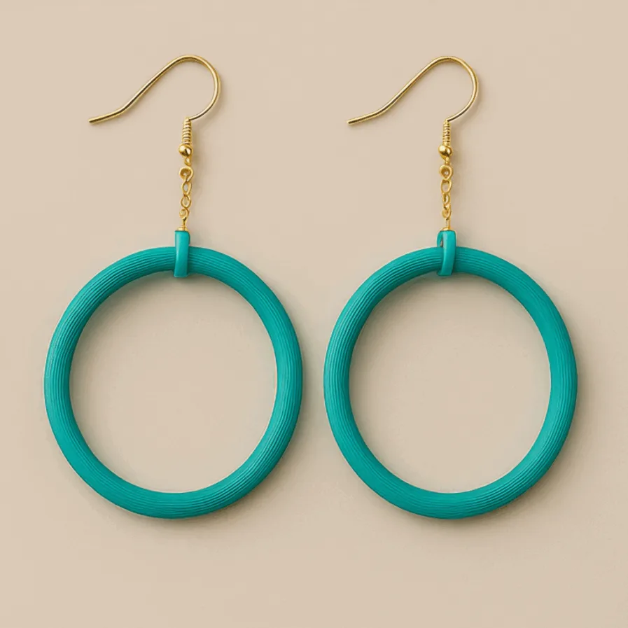 Turquoise dangle hoop earrings with gold hooks and circular matte frame