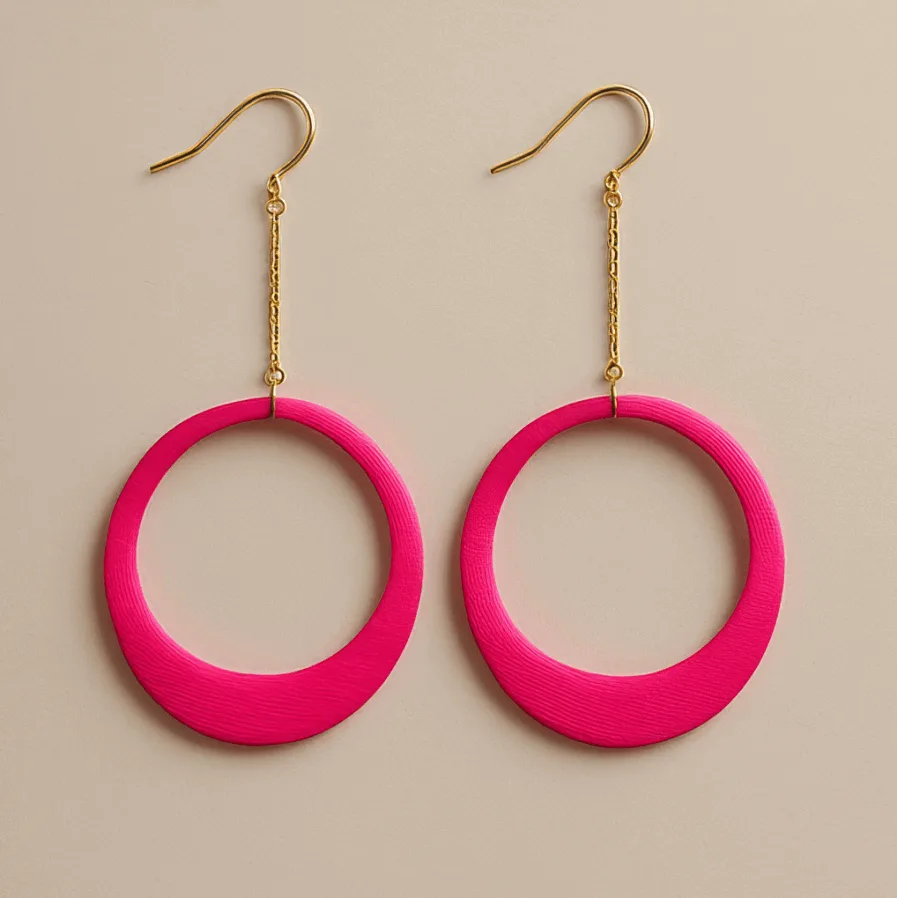 Pink hoop dangle earrings with chain detail and sculptural matte finish