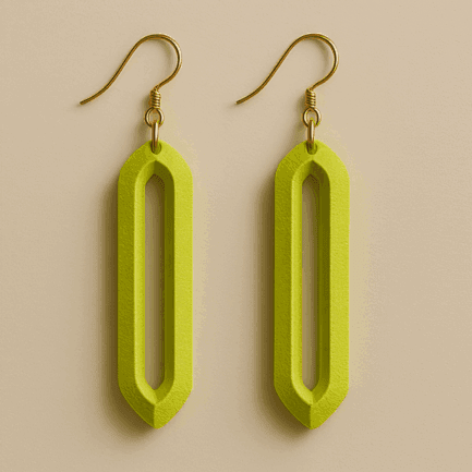 Long dangle earrings in neon yellow-green with geometric hollow design