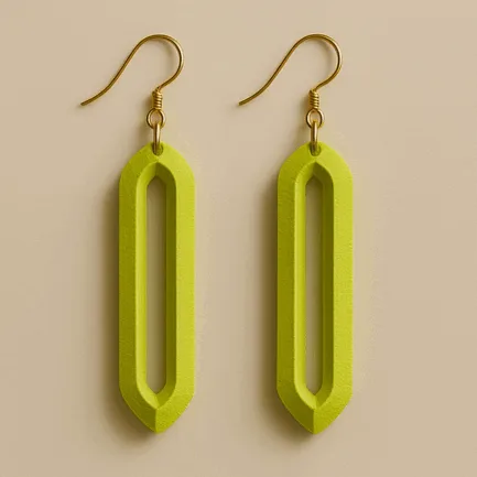 Long dangle earrings in neon yellow-green with geometric hollow design