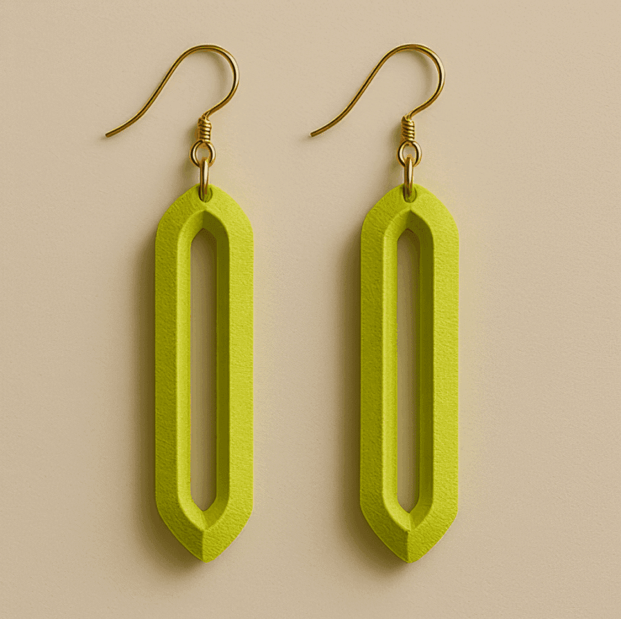 Long dangle earrings in neon yellow-green with geometric hollow design