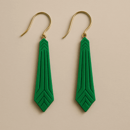 Green statement earrings with geometric arrow shape