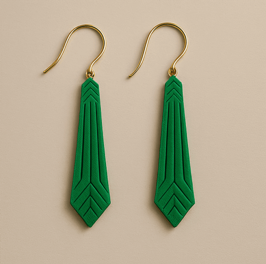Green statement earrings with geometric arrow shape