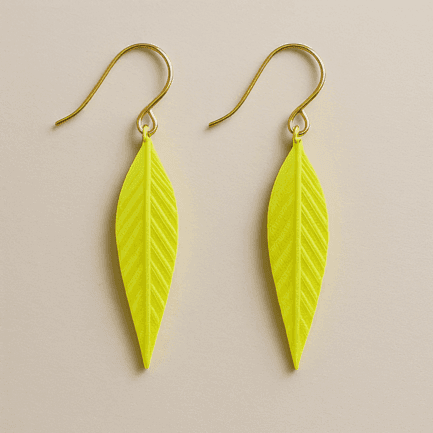 Leaf dangle earrings in bright green with sculptural texture
