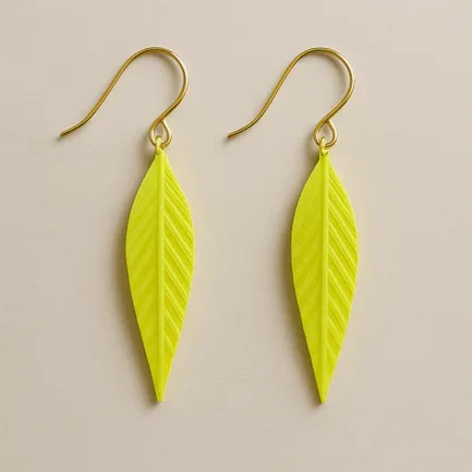 Leaf dangle earrings in bright green with sculptural texture