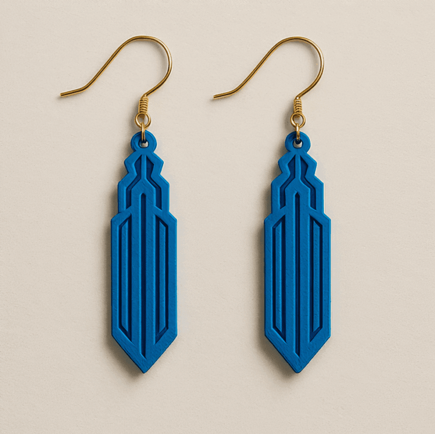 Art Deco earrings in bold blue with spire-shaped silhouette