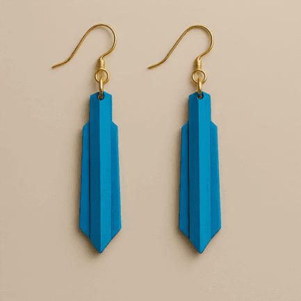 Blue earrings with sculptural arrow-like shape