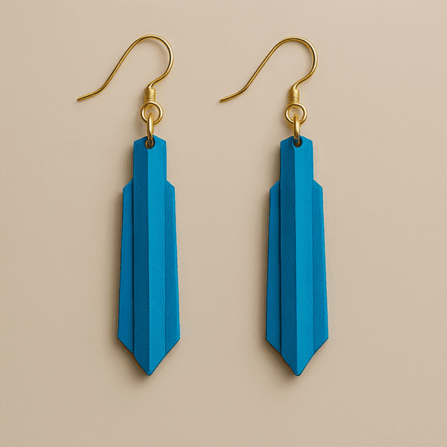 Blue earrings with sculptural arrow-like shape