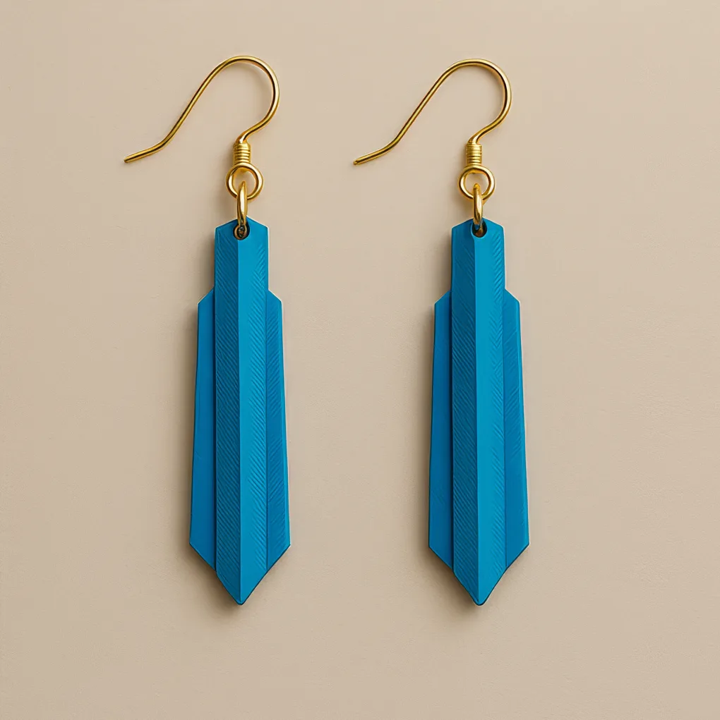 Blue earrings with sculptural arrow-like shape