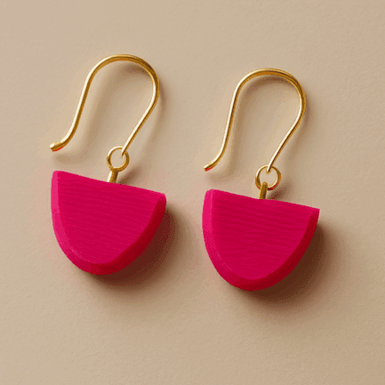 Magenta earrings in sculptural half-circle shape with gold hooks