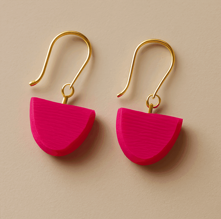 Magenta earrings in sculptural half-circle shape with gold hooks