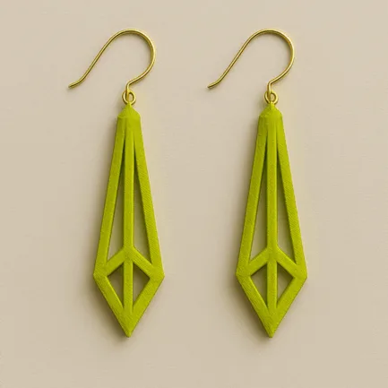 Bright green long gold dangle earrings with geometric openwork 3D design