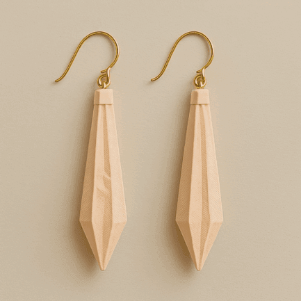 Long gold dangle earrings – 3D printed drop design with geometric nude charm